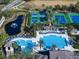 Aerial view of community pool and tennis courts at 11911 Mandevilla Ct, Tampa, FL 33626
