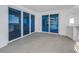 Covered balcony with glass doors and ocean views at 1350 Gulf Blvd # 703 704, Clearwater, FL 33767