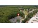 Aerial view of townhome in wooded area at 14215 Waterville Cir, Tampa, FL 33626
