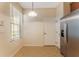 Kitchen nook features tile floor, window, and neutral colors at 14215 Waterville Cir, Tampa, FL 33626