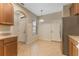 Bright kitchen nook with tile floor and access to exterior at 14215 Waterville Cir, Tampa, FL 33626