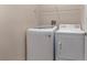 Convenient laundry room with washer and dryer included at 14215 Waterville Cir, Tampa, FL 33626