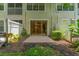 Private patio with adjacent green space and fence at 14215 Waterville Cir, Tampa, FL 33626
