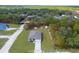 Aerial view of a single-story house with a yard at 14467 Hawk Rd, Brooksville, FL 34614