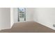Bedroom with water view and carpet flooring at 14467 Hawk Rd, Brooksville, FL 34614
