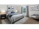 Spacious bedroom with a plush bed and a sitting area at 14467 Hawk Rd, Brooksville, FL 34614