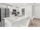 Modern kitchen with stainless steel appliances and a large island at 14467 Hawk Rd, Brooksville, FL 34614