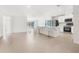 Modern kitchen with white cabinets, center island and stainless steel appliances at 14467 Hawk Rd, Brooksville, FL 34614