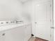 Laundry room with washer, dryer, and storage at 14467 Hawk Rd, Brooksville, FL 34614