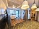 Open concept kitchen with granite countertops and stainless steel appliances at 18650 Gulf Blvd # 413, Indian Shores, FL 33785