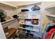 Spacious walk-in closet with shelving and hanging rods at 18650 Gulf Blvd # 413, Indian Shores, FL 33785