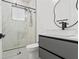 Stylish bathroom featuring a floating vanity and shower at 1905 W Erna Dr, Tampa, FL 33603