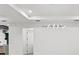 Modern dining room with sleek lighting fixture and white walls at 1905 W Erna Dr, Tampa, FL 33603