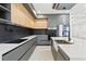 Modern kitchen with a farmhouse sink and gray cabinets at 1905 W Erna Dr, Tampa, FL 33603
