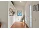 Bright and airy entryway with hardwood floors and a niche at 25237 Lexington Oaks Blvd, Wesley Chapel, FL 33544