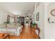 Open living and dining area with hardwood floors at 25237 Lexington Oaks Blvd, Wesley Chapel, FL 33544