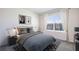 Bright bedroom with large window and comfortable bedding at 2883 Gardiner Ln, Zephyrhills, FL 33541