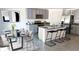 Modern kitchen with gray cabinets and an island at 2883 Gardiner Ln, Zephyrhills, FL 33541