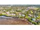 Aerial view of waterfront home with private dock and pool at 300 S Florida Ave # 400D, Tarpon Springs, FL 34689