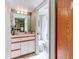 Clean bathroom with toilet, shower/tub combo, and vanity at 300 S Florida Ave # 400D, Tarpon Springs, FL 34689