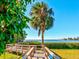 Wooden boardwalk path leading to waterfront views at 300 S Florida Ave # 400D, Tarpon Springs, FL 34689