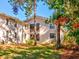 Building exterior showing a two story building with landscaping at 300 S Florida Ave # 400D, Tarpon Springs, FL 34689