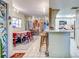 Unique dining area with eclectic decor and kitchen views at 300 S Florida Ave # 400D, Tarpon Springs, FL 34689