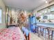 Bright and airy dining room with unique decor and kitchen views at 300 S Florida Ave # 400D, Tarpon Springs, FL 34689