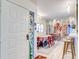 Bright dining room with unique wall art and adjacent kitchen at 300 S Florida Ave # 400D, Tarpon Springs, FL 34689