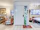 Inviting entryway with tiled floor, stained glass, and comfortable seating at 300 S Florida Ave # 400D, Tarpon Springs, FL 34689