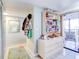 Bright entryway with coat rack and access to balcony at 300 S Florida Ave # 400D, Tarpon Springs, FL 34689
