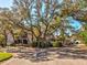 Condo building exterior with covered parking at 300 S Florida Ave # 400D, Tarpon Springs, FL 34689