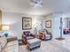 Relaxing living room with seating area and access to other rooms at 300 S Florida Ave # 400D, Tarpon Springs, FL 34689