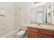 Clean bathroom with single vanity and tub shower combo at 31447 Shaker Cir, Wesley Chapel, FL 33543