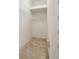 Walk in closet with wire shelving and carpet flooring at 31447 Shaker Cir, Wesley Chapel, FL 33543