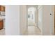Bright hallway with archway leading to the living area at 31447 Shaker Cir, Wesley Chapel, FL 33543