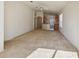 Open living room with high ceilings and views to the kitchen at 31447 Shaker Cir, Wesley Chapel, FL 33543