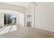 Sunlit living room with access to a back patio at 31447 Shaker Cir, Wesley Chapel, FL 33543