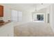 Spacious living room featuring a sliding glass door to the patio at 31447 Shaker Cir, Wesley Chapel, FL 33543