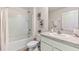 Clean bathroom with single vanity and a tub shower combo at 35161 Valley Ridge Rd, Dade City, FL 33525