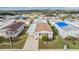 Single-Gathering home with carport and landscaping at 37539 Gill Ave, Zephyrhills, FL 33541