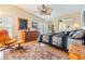 Comfortable bedroom with wood floors, ceiling fan, and ample closet space at 37539 Gill Ave, Zephyrhills, FL 33541