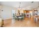 Bright dining room featuring a wood floor and stylish table with chairs at 37539 Gill Ave, Zephyrhills, FL 33541