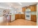 Well-equipped kitchen with wood cabinets and modern appliances at 37539 Gill Ave, Zephyrhills, FL 33541