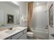 Clean bathroom featuring a bathtub, shower, and vanity with a quartz countertop at 4177 Feldspar Ln, Spring Hill, FL 34609