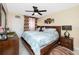 King-size bedroom with ceiling fan and plenty of closet space at 5728 14Th N Ave # 305B, St Petersburg, FL 33710