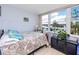 Comfortable bedroom with large window and ample natural light at 5728 14Th N Ave # 305B, St Petersburg, FL 33710