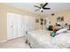 Spacious bedroom with a double bed, built-in closet and ceiling fan at 5728 14Th N Ave # 305B, St Petersburg, FL 33710