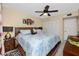 King-size bedroom with ceiling fan, large closet and dresser at 5728 14Th N Ave # 305B, St Petersburg, FL 33710