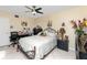 Bedroom with a double bed, nightstands and a home office setup at 5728 14Th N Ave # 305B, St Petersburg, FL 33710